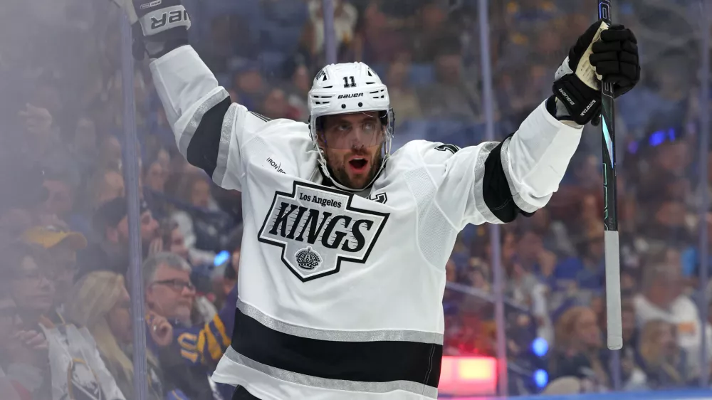 Oct 10, 2024; Buffalo, New York, USA; Los Angeles Kings center Anze Kopitar (11) reacts after scoring a goal during the third period against the Buffalo Sabres at KeyBank Center. Mandatory Credit: Timothy T. Ludwig-Imagn Images