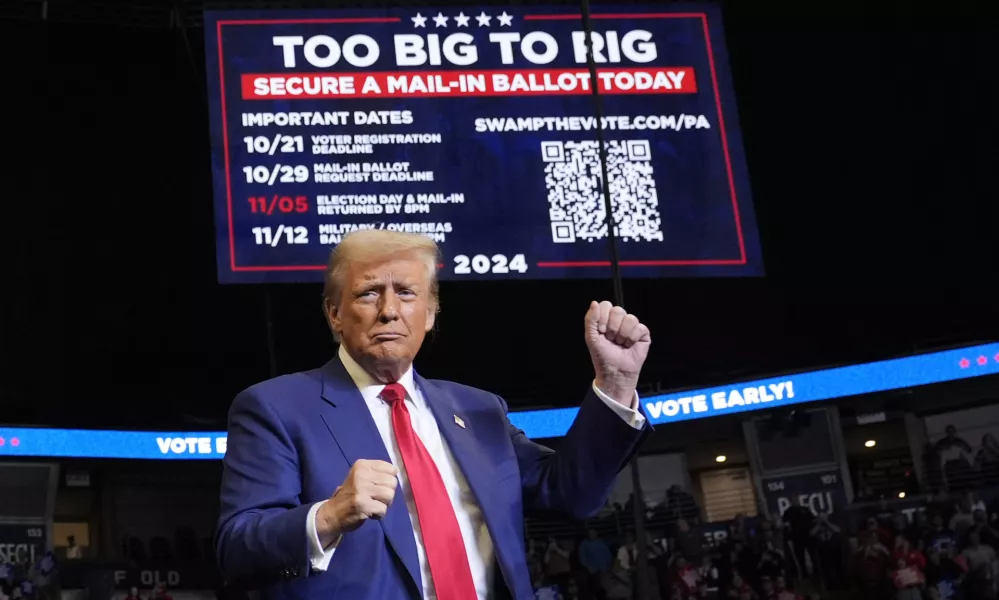 Republican presidential nominee former President Donald Trump dances at a campaign rally at the Bryce Jordan Center, Saturday, Oct. 26, 2024, in State College, Pa. (AP Photo/Alex Brandon)