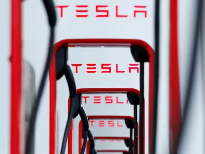 FILE PHOTO: A row of Tesla Superchargers is shown at a charging location in Los Angeles, California, U.S., June 5, 2024.  REUTERS/Mike Blake/File Photo