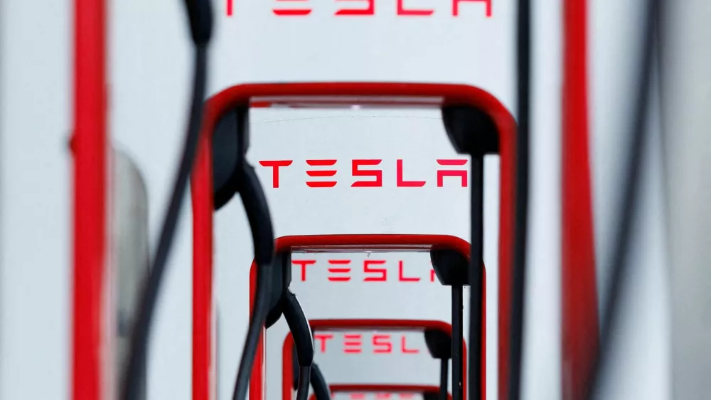 FILE PHOTO: A row of Tesla Superchargers is shown at a charging location in Los Angeles, California, U.S., June 5, 2024.  REUTERS/Mike Blake/File Photo