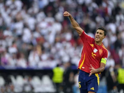 FILE - Spain's Rodri celebrates after a quarterfinal match between Germany and Spain at the Euro 2024 soccer tournament in Stuttgart, Germany, Friday, July 5, 2024. (AP Photo/Antonio Calanni, File)