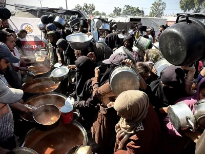 KHAN YUNIS, GAZA - OCTOBER 28: Palestinian children receive the food distributed by charitable organizations to those who fled the Israeli army attacks and took refuge in Khan Yunis, Gaza on October 28, 2024. Palestinians are struggling with hunger due to the embargo imposed on the region as Israeli attacks on the Gaza Strip continue uninterruptedly. Doaa Albaz / AnadoluNo Use USA No use UK No use Canada No use France No use Japan No use Italy No use Australia No use Spain No use Belgium No use Korea No use South Africa No use Hong Kong No use New Zealand No use Turkey