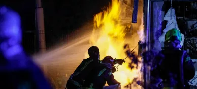 Firefighters work at a site of an apartment building hit by a Russian drone strike, amid Russia's attack on Ukraine, in Kyiv, Ukraine October 29, 2024. REUTERS/Gleb Garanich