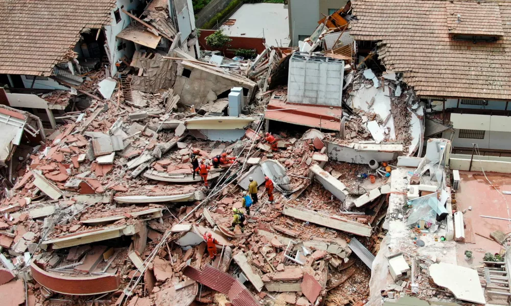 A drone view shows rescue workers searching for victims amidst the remains of the hotel Dubrovnik, after it collapsed, in the coastal city of Villa Gesell, Buenos Aires, Argentina October 29, 2024. REUTERS/Pablo Funes