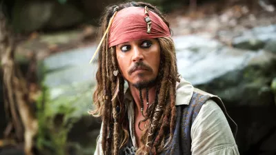 In this film publicity image released by Disney, Johnny Depp portrays Captain Jack Sparrow in a scene from, "Pirates of the Caribbean: On Stranger Tides." (AP Photo/Disney, Peter Mountain)