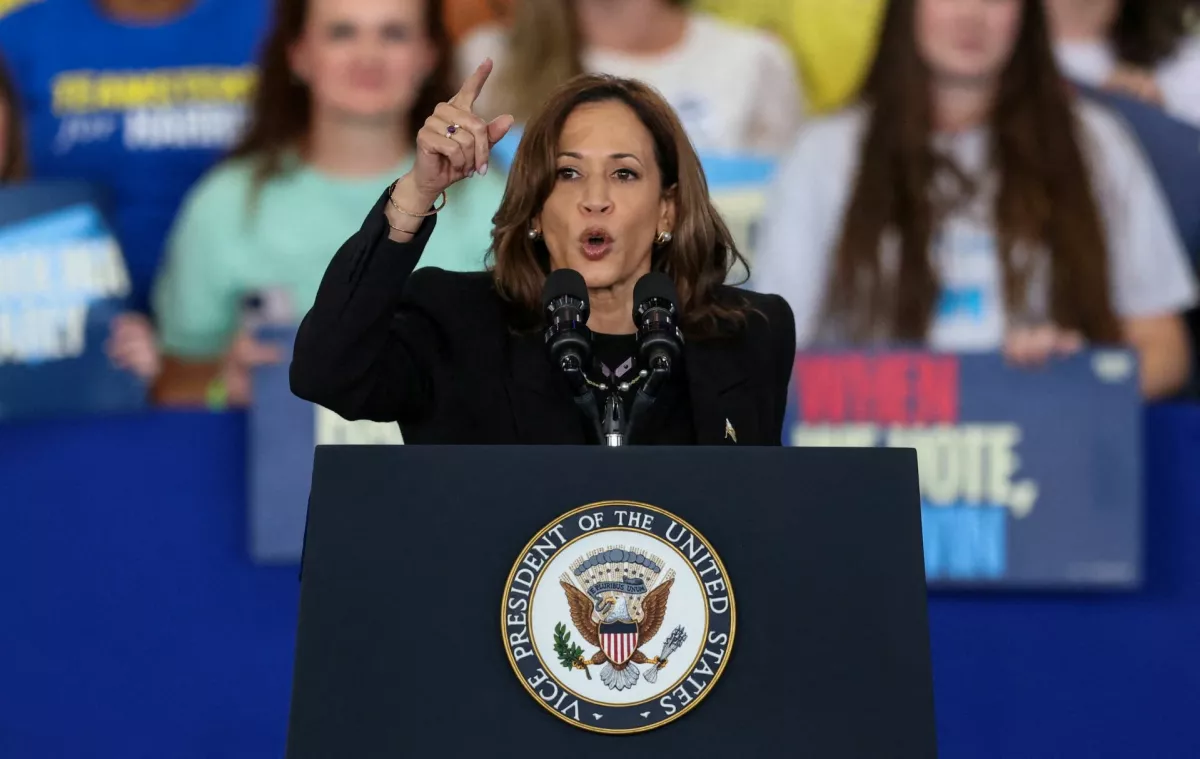 FILE PHOTO: Democratic presidential nominee U.S. Vice President Kamala Harris speaks during a rally at Coastal Credit Union Music Park at Walnut Creek, in Raleigh, North Carolina, U.S., October 30, 2024. REUTERS/Sam Wolfe/File Photo