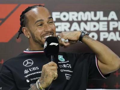 Mercedes driver Lewis Hamilton, of Britain, smiles during a press conference ahead of the Brazilian Formula One Grand Prix at the Interlagos race track in Sao Paulo, Brazil, Thursday, Oct. 31, 2024. (AP Photo/Andre Penner)