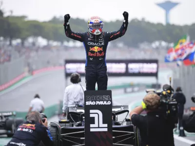 Red Bull driver Max Verstappen of the Netherlands, celebrates finishing first in the Brazilian Formula One Grand Prix at the Interlagos race track, in Sao Paulo, Brazil, Sunday, Nov. 3, 2024. (AP Photo/Ettore Chiereguini)