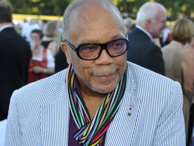 FILED - 21 July 2015, Bavaria, Munich: US-American jazz trumpeter and music producer Quincy Jones stands at the summer reception of the Bavarian State Parliament at Schleissheim Palace. Jones died on Sunday evening at his home in Bel Air in Los Angeles surrounded by his family, his spokesperson announced. Photo: Ursula Düren/dpa