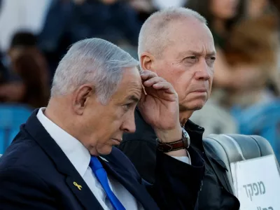 FILE PHOTO: Israeli Prime Minister Benjamin Netanyahu and Israeli Defense Minister Yoav Gallant attend a ceremony for the 70th cohort of military combat officers, at an army base near Mitzpe Ramon, Israel, October 31, 2024. REUTERS/Amir Cohen/File Photo