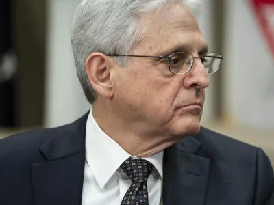 Attorney General Merrick Garland listens as Health and Human Services Secretary Xavier Becerra speaks during a meeting with a task force on reproductive health care access, in the Roosevelt Room of the White House, Wednesday, April 12, 2023, in Washington. (AP Photo/Evan Vucci)