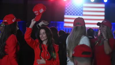 Supporters of Republican presidential nominee and former U.S. President Donald Trump react at the site of his rally, at the Palm Beach County Convention Center in West Palm Beach, Florida, U.S., November 6, 2024. REUTERS/Callaghan O'hare