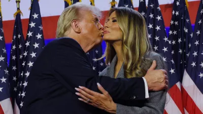 Republican presidential nominee and former U.S. President Donald Trump takes the stage with his wife Melania to address supporters at his rally, at the Palm Beach County Convention Center in West Palm Beach, Florida, U.S., November 6, 2024. REUTERS/Brian Snyder