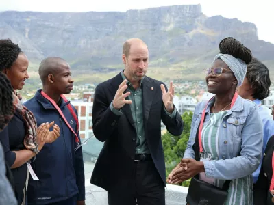 Prince William, Prince of Wales chats with young climate activists in front of the iconic Table Mountain at the Earthshot Prize Climate Leaders Youth Programme on November 04, 2024 in Cape Town, South Africa. During his visit, The Prince of Wales will attend the fourth annual Earthshot Prize Awards and engaged in various environmental initiatives and participated in events held in Cape Town as part of 'Earthshot Week'.The Earthshot Prize Climate Leaders Youth Programme. Prince William, Prince of Wales visit to Cape Town, South Africa - 04 Nov 2024As part of 'Earthshot Week' in South Africa, The Prince will take part in a series of events, spotlighting groundbreaking environmental solutions and bringing together world-leading innovators, investors and philanthropists to drive forward the restoration and protection of our planet.,Image: 930324103, License: Rights-managed, Restrictions:, Model Release: no