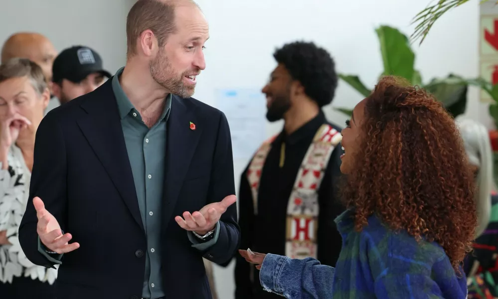 Prince William, Prince of Wales and Nomzamo Mbatha chat during the Earthshot Prize Climate Leaders Youth Programme on November 04, 2024 in Cape Town, South Africa. During his visit, The Prince of Wales will attend the fourth annual Earthshot Prize Awards and engaged in various environmental initiatives and participated in events held in Cape Town as part of 'Earthshot Week'.The Earthshot Prize Climate Leaders Youth Programme. Prince William, Prince of Wales visit to Cape Town, South Africa - 04 Nov 2024As part of 'Earthshot Week' in South Africa, The Prince will take part in a series of events, spotlighting groundbreaking environmental solutions and bringing together world-leading innovators, investors and philanthropists to drive forward the restoration and protection of our planet.,Image: 930320989, License: Rights-managed, Restrictions:, Model Release: no