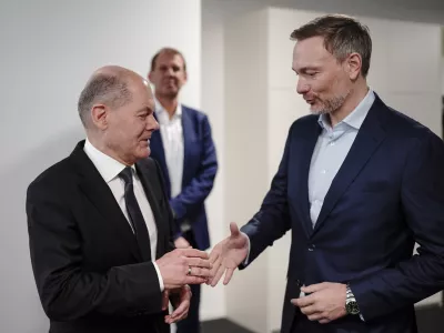 FILED - 26 February 2024, Berlin: German Chancellor Olaf Scholz (L) greets Minister of Finance Christian Lindner backstage at the Chief Editors' Conference 2024 in the dpa newsroom. Scholz has sacked Finance Minister Christian Lindner of the pro-business Free Democrats, a government spokesman told dpa on Wednesday evening, as Germany's troubled coalition government threatened to collapse. Photo: Michael Kappeler/dpa