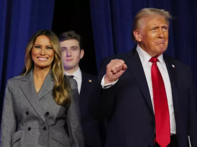 Republican presidential nominee and former U.S. President Donald Trump takes the stage with his wife Melania and son Barron to address supporters at his rally, at the Palm Beach County Convention Center in West Palm Beach, Florida, U.S., November 6, 2024. REUTERS/Brian Snyder