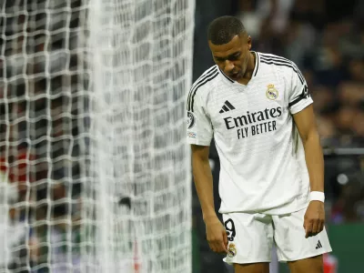 Soccer Football - Champions League - Real Madrid v AC Milan - Santiago Bernabeu, Madrid, Spain - November 5, 2024 Real Madrid's Kylian Mbappe reacts REUTERS/Susana Vera