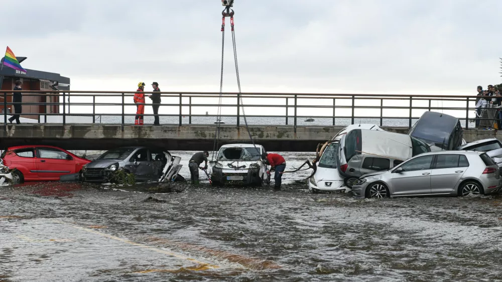 08 November 2024, Spain, Cadaques: Municipality workers with construction vehicles start debris removal works after heavy rains cause flash floods. Photo: Glòria Sánchez/EUROPA PRESS/dpa