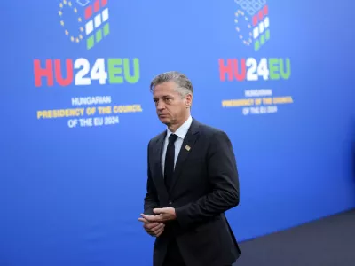 Slovenia's Prime Minister Robert Golob arrives for an EU Summit at the Puskas Arena in Budapest, Hungary, Friday, Nov. 8, 2024. (AP Photo/Petr David Josek)