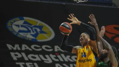 FILE - Maccabi's Jasiel Rivero, left, tries to score as Panathinaikos' Mathias Lessort blocks him during the Euroleague basketball match between Maccabi Tel Aviv and Panathinaikos in Belgrade, Serbia, Thursday, May 2, 2024. (AP Photo/Darko Vojinovic, File)