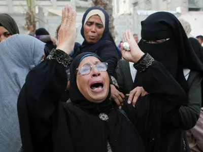 A woman reacts as people mourn Palestinians killed in Israeli strikes, at Nasser hospital in Khan Younis in the southern Gaza Strip November 9, 2024. REUTERS/Hatem Khaled