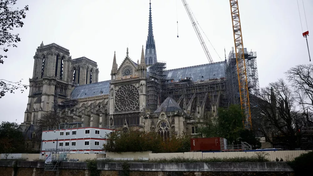 General view of the Notre-Dame de Paris Cathedral, which was ravaged by a fire in 2019, as restoration works continue one month before its reopening, in Paris, France, November 7, 2024. REUTERS/Sarah Meyssonnier