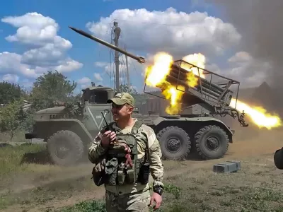 In this photo, taken from video released by the Russian Defense Ministry Press Service on Monday, July 1, 2024, Russian soldiers fire from the BM-21 "Grad" self-propelled 122 mm multiple rocket launcher in an undisclosed location in Ukraine. (Russian Defense Ministry Press Service via AP, File)