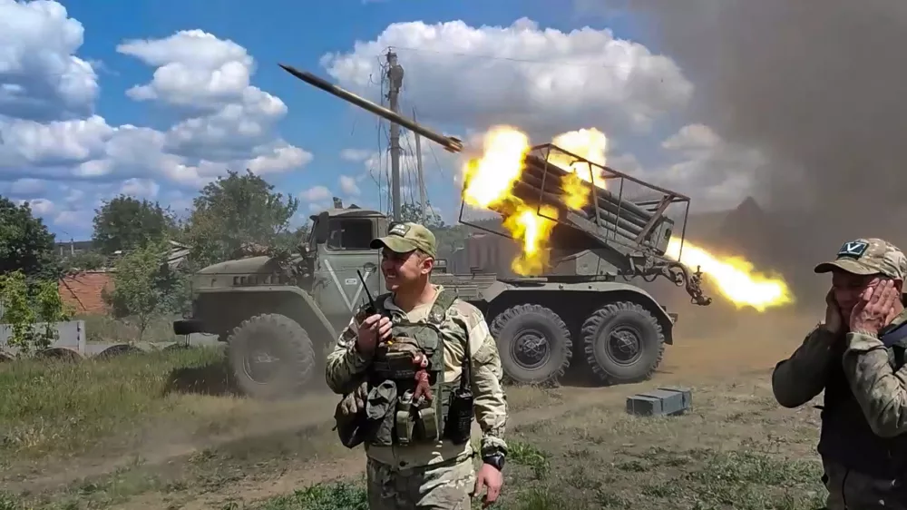 In this photo, taken from video released by the Russian Defense Ministry Press Service on Monday, July 1, 2024, Russian soldiers fire from the BM-21 "Grad" self-propelled 122 mm multiple rocket launcher in an undisclosed location in Ukraine. (Russian Defense Ministry Press Service via AP, File)