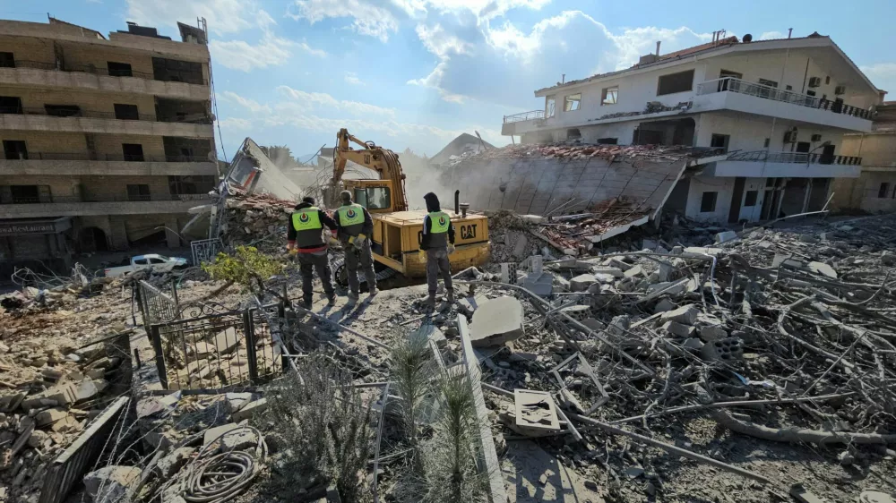 Civil defence members of the Islamic Health Authority work at a damaged site, in the aftermath of an Israeli strike in Mashghara, in the western part of Lebanon's Bekaa Valley, Lebanon November 10, 2024. REUTERS/Maher Abou Taleb