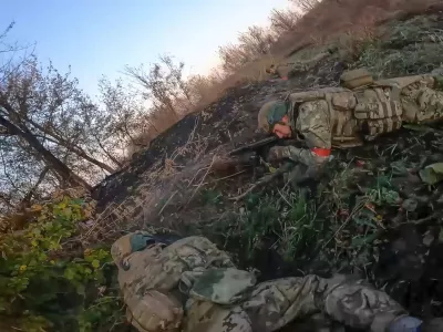 In this image taken from a video released by the Russian Defense Ministry on Thursday, Nov. 7, 2024, Russian Army soldiers fight with Ukrainian Armed forces in the Sudzhansky district of the Kursk region of Russia. (Russian Defense Ministry Press Service via AP)