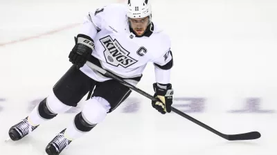 Nov 11, 2024; Calgary, Alberta, CAN; Los Angeles Kings center Anze Kopitar (11) skates during the warmup period against the Calgary Flames at Scotiabank Saddledome. Mandatory Credit: Sergei Belski-Imagn Images