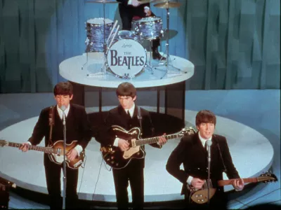 FILE - In this Feb. 9, 1964 picture, The Beatles perform at the "Ed Sullivan Show," in New York. It was the band's first American appearance, and influenced other musicians future careers. Front row from left; Paul McCartney, George Harrison and John Lennon. Drummer Ringo Starr is at rear. Nearly 40 years after breaking up, The Beatles are still breaking records for album sales. EMI Group PLC says consumers in North America, Japan and the U.K. bought more than 2.25 million copies of the Fab Four's re-mastered albums in the first five days after their Sept. 9, 2009 release. (AP Photo)