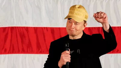 FILE PHOTO: Tesla CEO and X owner Elon Musk, who supports Republican presidential nominee former U.S. President Donald Trump, gestures as he speaks about voting during an America PAC Town Hall in Folsom, Pennsylvania, U.S., October 17, 2024. REUTERS/Rachel Wisniewski/File Photo