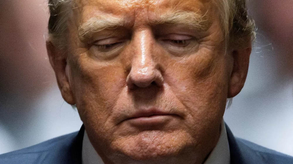 FILE PHOTO: Former US President Donald Trump after a jury found him guilty on all 34 counts in his criminal trial in New York State Supreme Court in New York, New York, USA, 30 May 2024. Trump is facing 34 felony counts of falsifying business records related to payments made to adult film star Stormy Daniels during his 2016 presidential campaign.   JUSTIN LANE/Pool via REUTERS/File Photo