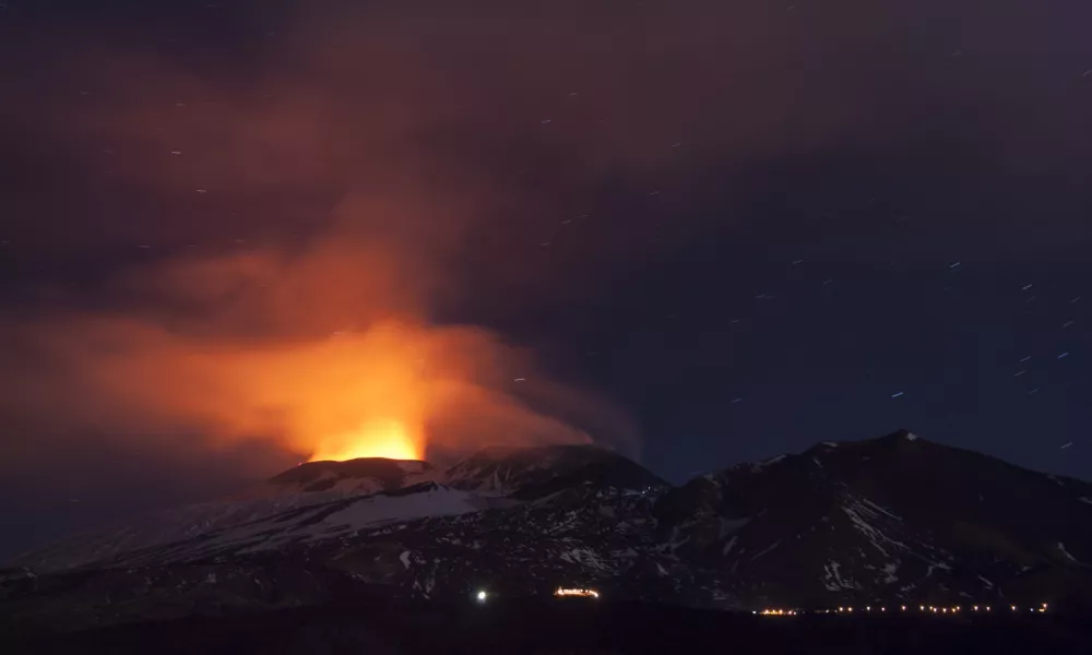 ﻿In this picture made available Friday, Dec. 4, 2015, Mt. Etna spews lava during an eruption, near Catania, Italy, Thursday Dec. 3, 2015. Mt. Etna is Europe's most active volcano at 3,350 meters (10,990 feet) and erupts quite frequently. (AP Photo/Salvatore Allegra)