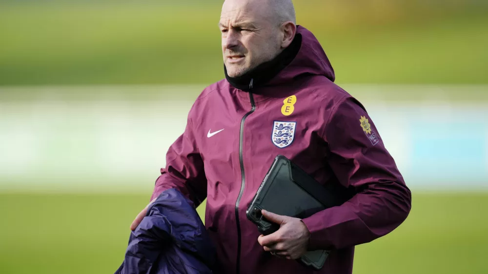 England Interim Manager Lee Carsley looks on during a training session at St George's Park, Burton upon Trent, England, Wednesday Nov. 13, 2024. (Nick Potts/PA via AP)