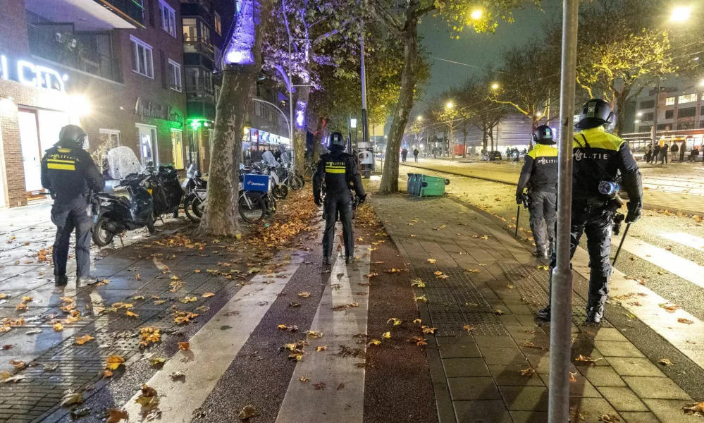 Dutch police patrol after riots in Amsterdam, Netherlands, November 11, 2024. Mizzle Media/Handout via REUTERS  THIS IMAGE HAS BEEN SUPPLIED BY A THIRD PARTY. MANDATORY CREDIT