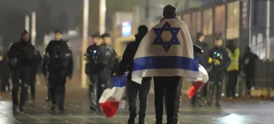 Soccer supporters leave after the Nations League soccer match France against Israel outside the Stade de France stadium, Thursday, Nov. 14, 2024 in Saint-Denis, outside Paris. (AP Photo/Christophe Ena)