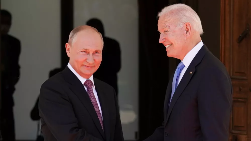 ﻿U.S. President Joe Biden and Russia's President Vladimir Putin shake hands as they arrive for the U.S.-Russia summit at Villa La Grange in Geneva, Switzerland, June 16, 2021. REUTERS/Kevin Lamarque