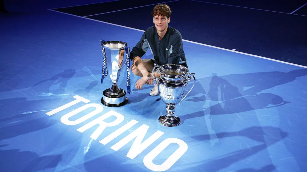 17 November 2024, Italy, Turin: Italian tennis player Jannik Sinner celebrates with the trophies after winning the ATP World Tour Finals Men's Singles tennis match against US Taylor Fritz at the Inalpi Arena. Photo: Marco Alpozzi/LaPresse via ZUMA Press/dpa