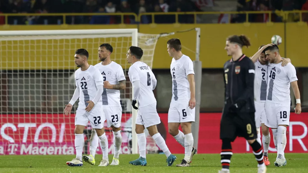 Soccer Football - Nations League - Group Stage - Austria v Slovenia - Ernst Happel Stadion, Vienna, Austria - November 17, 2024 Slovenia's Adam Gnezda Cerin celebrates scoring their first goal with teammates REUTERS/Lisa Leutner