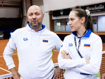 Andrej Krasevec, captain of Slovenia and Kaja Juvan during Day 1 of Billie Jean King Cup Qualifiers between Slovenia and Netherlands, on November 15, 2024 in Bela dvorana, Velenje, Slovenia. Photo by Vid Ponikvar / Sportida