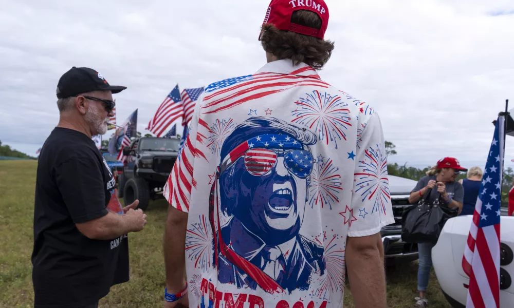 Supporters with decorated trucks and cars gather for a victory parade for President-elect Donald Trump, Sunday, Nov. 17, 2024, in West Palm Beach, Fla. (AP Photo/Alex Brandon)