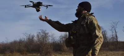 In this photo provided by the Ukraine's 65th Mechanised Brigade press service on Nov. 19, 2024, a Ukrainian soldier launches a drone during a training at a polygon in Zaporizhzhia region, Ukraine. (Andriy Andriyenko/Ukraine's 65th Mechanised Brigade via AP)