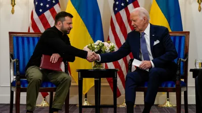 U.S. President Joe Biden shakes hands with Ukrainian President Volodymyr Zelenskiy in Paris, France, June 7, 2024. REUTERS/Elizabeth Frantz REFILE - QUALITY REPEAT