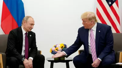 FILE PHOTO: U.S. President Donald Trump gestures during a bilateral meeting with Russia's President Vladimir Putin at the G20 leaders summit in Osaka, Japan, June 28, 2019. REUTERS/Kevin Lamarque/File Photo