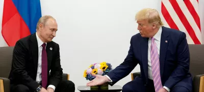 FILE PHOTO: U.S. President Donald Trump gestures during a bilateral meeting with Russia's President Vladimir Putin at the G20 leaders summit in Osaka, Japan, June 28, 2019. REUTERS/Kevin Lamarque/File Photo