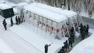 Emergency personnel walk into radiation-resistant mobile bomb shelters in Nizhny Novgorod region, Russia February 10, 2023. Russian Scientific Research Institute for Civil Defence and Emergencies of EMERCOM/Handout via REUTERS ATTENTION EDITORS - THIS IMAGE WAS PROVIDED BY A THIRD PARTY. NO RESALES. NO ARCHIVES. MANDATORY CREDIT