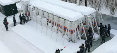 Emergency personnel walk into radiation-resistant mobile bomb shelters in Nizhny Novgorod region, Russia February 10, 2023. Russian Scientific Research Institute for Civil Defence and Emergencies of EMERCOM/Handout via REUTERS ATTENTION EDITORS - THIS IMAGE WAS PROVIDED BY A THIRD PARTY. NO RESALES. NO ARCHIVES. MANDATORY CREDIT